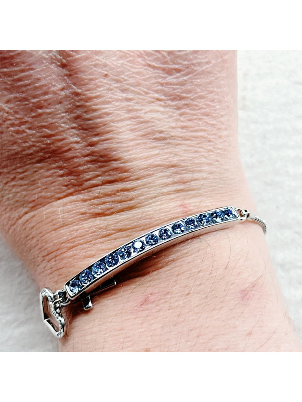 5470gc. Silvertone Blessed Bracelet Blue